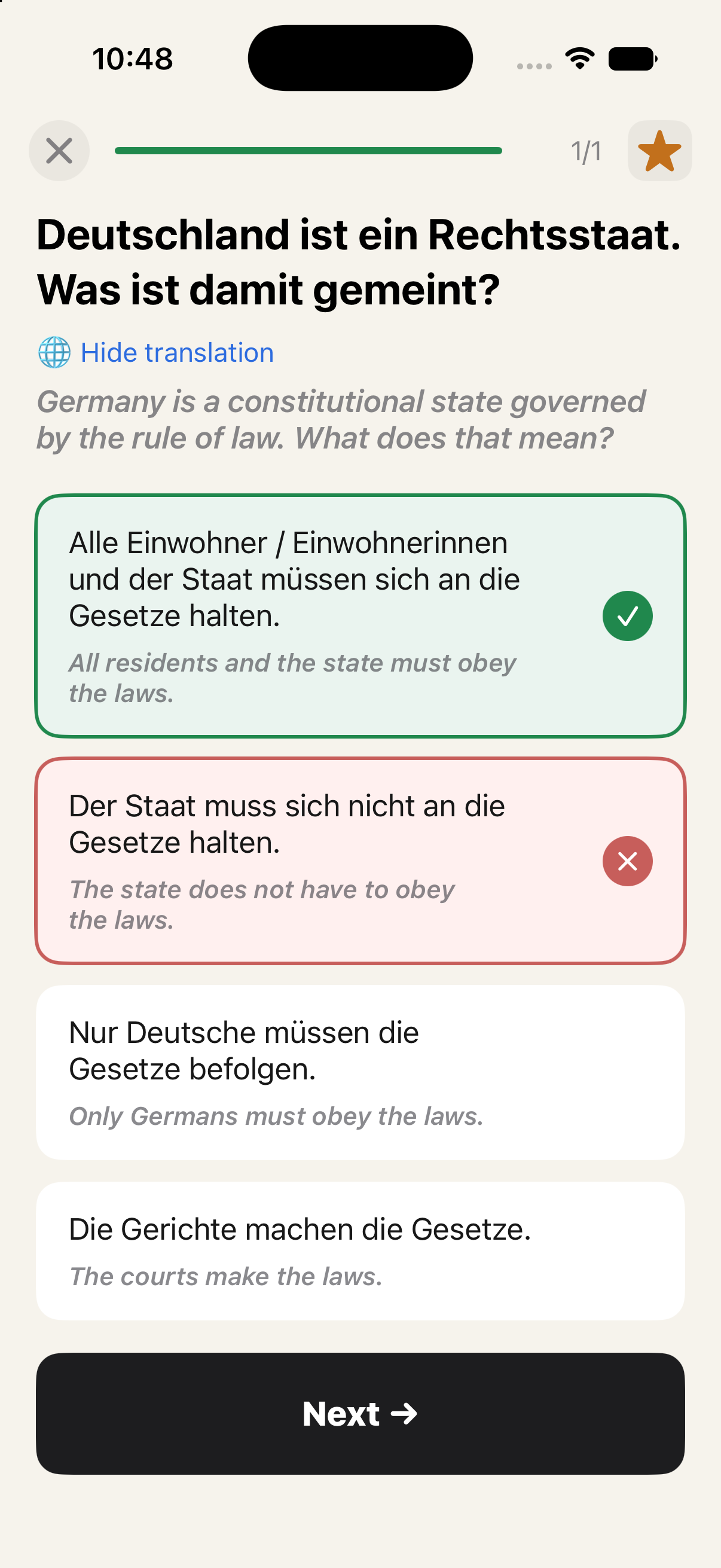 Testbereit practice screen showing a German test question with English translation.